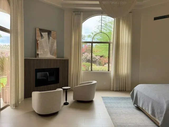 Bedroom sitting area: slat fireplace