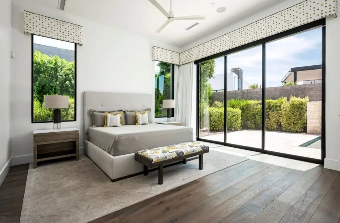 Primary bedroom: light-filled and serene
